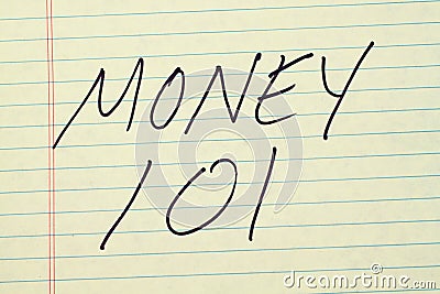 Money 101 On A Yellow Legal Pad Stock Photo