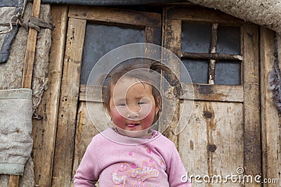 Mongolian child infront of Ger doors Editorial Stock Photo