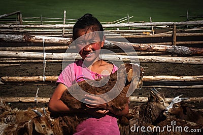 Mongolian Girl With Goat Editorial Stock Photo