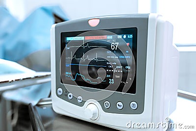 Monitoring of ECG, blood pressure, saturation of the patient during surgery. Cardiac monitor Editorial Stock Photo
