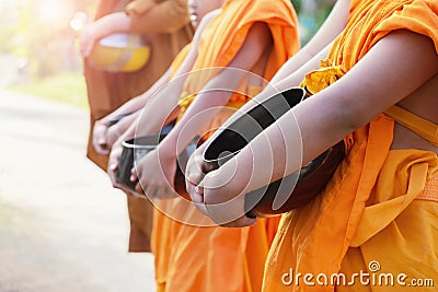 the monk alms round in Stock Photo