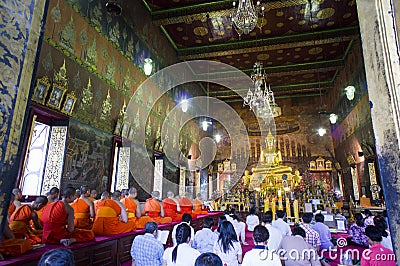 Monk and Buddhist worship Gold Buddha Editorial Stock Photo