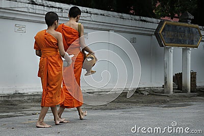 Monk coming back in temple Editorial Stock Photo