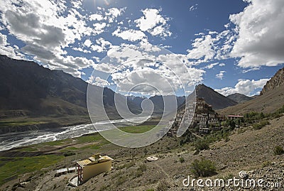 A monk taking picture of Kye monastery or ki monastery with his mobile Stock Photo