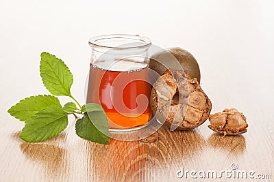 Monk tea on wooden background. Stock Photo