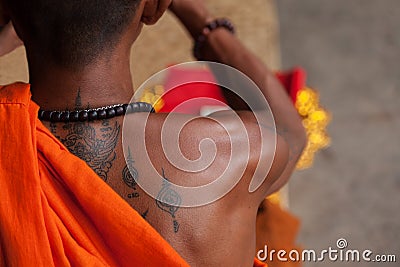 Monk with traditional tattoo Editorial Stock Photo