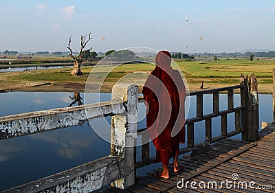 The monk at Ubien bridge, Myanmar Stock Photo