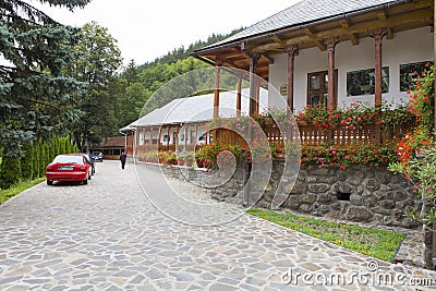 Monk walking on a alley and the monk living houses Stock Photo