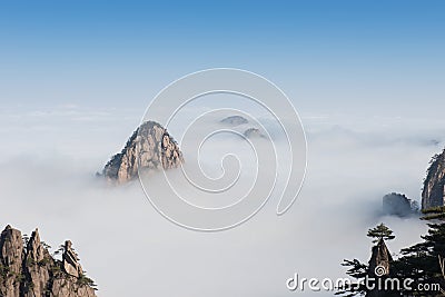Monkey watch sea cloud ,Mt. Huangshan in Anhui, China Stock Photo