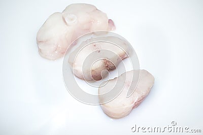 Monkfish tail steaks. over white Stock Photo