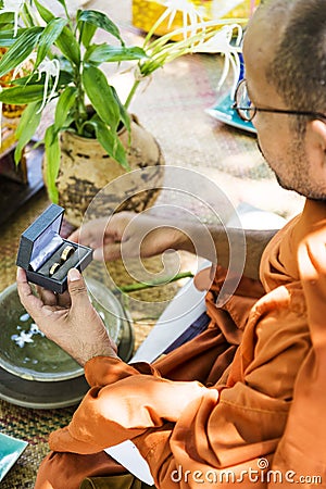 Monks blessing buddhist wedding ring ceremony in cambodia asia Editorial Stock Photo