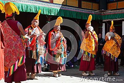 The monks perform religious buddhistic dance during the Mani Rimdu festival in Tengboche Monastery Editorial Stock Photo