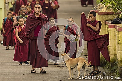 Monks returning from school Editorial Stock Photo