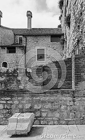 Monochrome city landscape: summer, an old stone city with destroyed brick walls. Dolmatia, Split, Diocletian& x27;s Palace Stock Photo