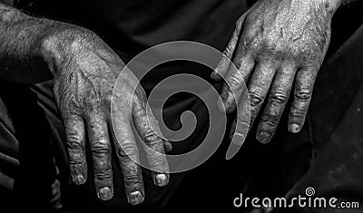 Monochrome , high contrast image of dirty , tired working man hands Stock Photo
