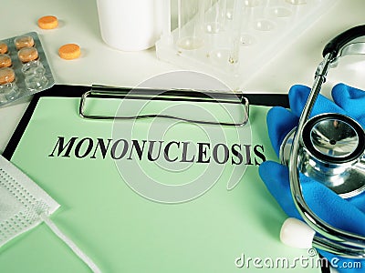 Mononucleosis diagnosis on the green sheet. Stock Photo