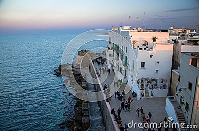 Monopoli, Italy - April 23, 2017: Embankment of Monopoli town, view from Castle of Carlo V Editorial Stock Photo