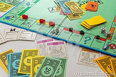 Monopoly board game in play Editorial Stock Photo