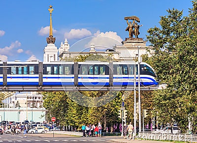 Monorail train on a background of the main entrance of ENEA Editorial Stock Photo