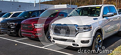 Monroeville, Pennsylvania, USA November 12, 2023 Three new Dodge Ram pickup trucks lined up for sale at a dealership Editorial Stock Photo