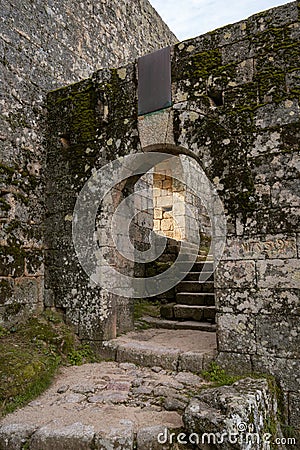 Monsanto historic village stone gate entrance to the castle, in Portugal Editorial Stock Photo