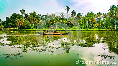 Scenic Houseboat on the backwaters during monsoon in Alleppey, Kerala, India Editorial Stock Photo