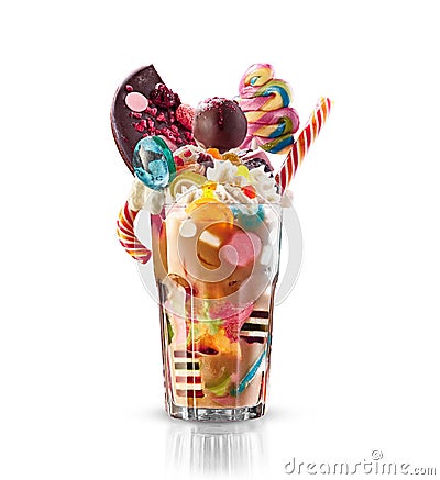 Monster shake, freak caramel shake isolated. Colourful, festive milk shake cocktail with sweets, jelly. Colored caramel Stock Photo