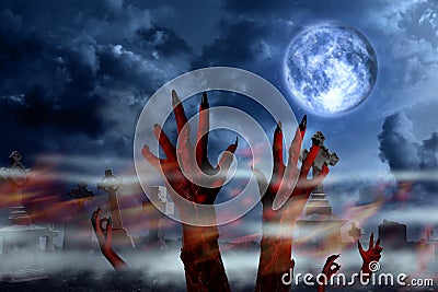 Scary monsters arising from graves at old misty cemetery under full moon on Halloween night Stock Photo