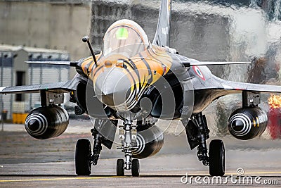 MONT-DE-MARSAN, FRANCE - MAY 17, 2019: Special painted French Air Force Dassault Rafale fighter jet plane taxiing to the runway Editorial Stock Photo