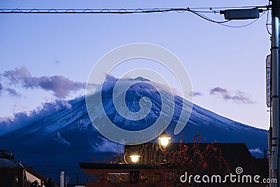 Mount Fuji beautiful view at night from Kawagushiko in autumn with maple leaves (momiji) Stock Photo