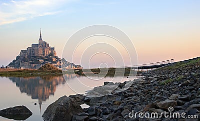 Mont Saint-Michel reflected in water at dawn Editorial Stock Photo