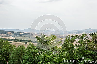 Pienza, Tuscany, Italy / 24th July 2016 / Scenic view of cultivated fields in summer in Orcia Valley Editorial Stock Photo