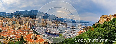 Monte Carlo panorama with luxury yachts and grand stands by the in harbor for Grand Prix F1 race in Monaco, Cote d'Azur Editorial Stock Photo