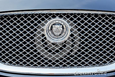Jaguar luxury car silver logo in a summer day in Monte Carlo, Monaco Editorial Stock Photo