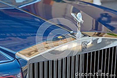 Rolls Royce luxury blue car silver statue detail and logo in a summer day in Monte Carlo Editorial Stock Photo