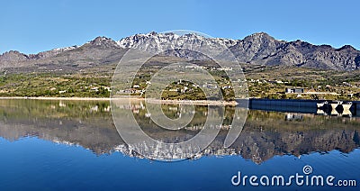 Monte Cinto Massif reflecting in Calacuccia Lake Stock Photo