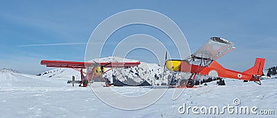 Monte Pora, Bergamo, Italy. A single engined, general aviation red light aircraft parked on a snow covered plateau Editorial Stock Photo