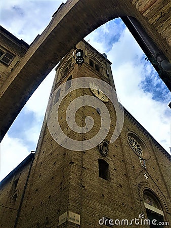 Montecassiano town, Marche region, Italy. Medieval buildings, church, clock tower, beauty, history and time Stock Photo