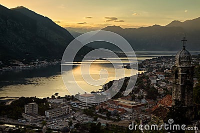 Montenegro Kotor bay sunset landscape summer travel destination, old town with church building panoramic view, Adriatic Stock Photo