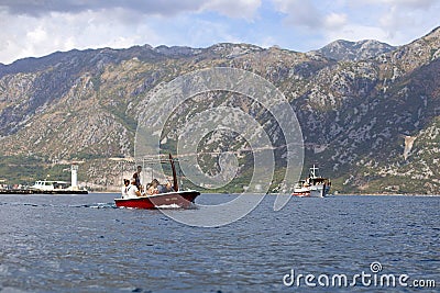 tourists on a boat on the sea Editorial Stock Photo