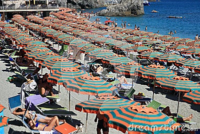 Monterosso Beach Packed With Vacationers and Umbrellas Editorial Stock Photo