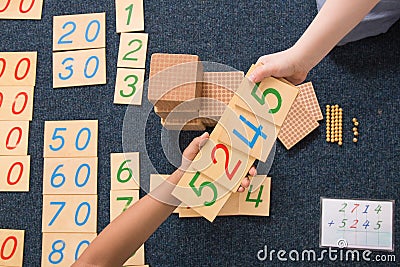 Montessori learning with numbers on wooden blocks Stock Photo