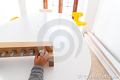 Montessori student hands using sensory materials in a school Stock Photo