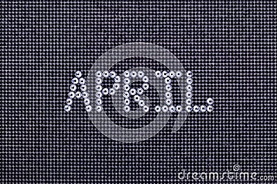 Month APRIL is made rhinestones crystal color on a black canvas Stock Photo