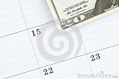 Monthly calendar with 20 dollar bills Stock Photo