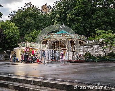 Montmartre carousel on plaza at dusk after rain Editorial Stock Photo