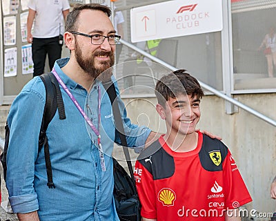 04.06.2023. Montmeló, Spain, Cristobal Rosaleny taking a photo with the youngest fans at the Spanish GP 2023 Editorial Stock Photo