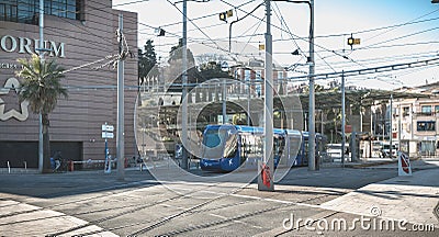 Electric tramway passing the Corum, a convention center and Opera Berlioz in Montpellier, France Editorial Stock Photo