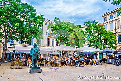 MONTPELLIER, FRANCE, JUNE 25, 2017: People are sitting at restaurants at Place jean Jaures in the center of Montpellier, France Editorial Stock Photo