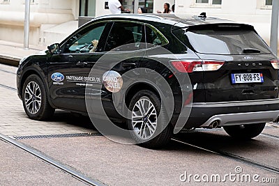 Ford Kuga advertising vehicle with stickers door car of text sign in Montpellier of Editorial Stock Photo